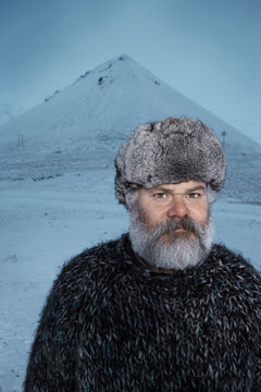 Portrait of a Man in winter landscape
