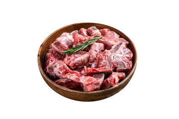 Fresh Raw meat on the bone diced for goulash in a wooden plate.  Isolated, Transparent background.