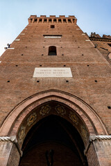 Low angle street view of church tower, Comacchio, Country Italy, Region Emilia-Romagna, Province...