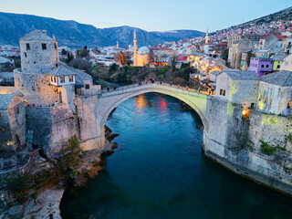 Twilight view of the Old Bridge in Mostar city in Bosnia and Herzegovina. Neretva river. Unesco...