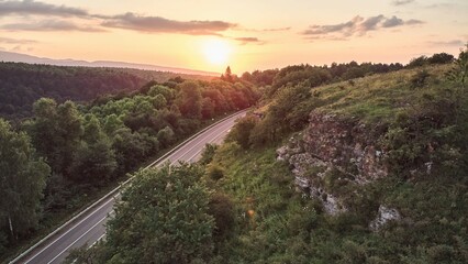 Mountain landscape from a high point and a road. Travel and tourism. The time of year is the end of...