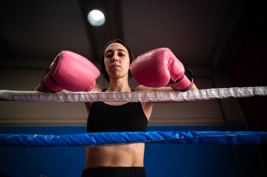 Determined female boxer during fitness class at gym