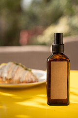 beige brown jar bottle of shampoo cream on the sea on the beach in summer