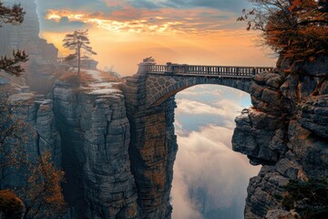 A bridge spanning a vast chasm, representing the journey of overcoming obstacles and connecting dreams with reality - obrazy, fototapety, plakaty