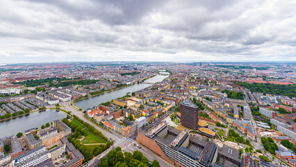 Fototapeta na wymiar Copenhagen, Denmark. Copenhagen lakes. Panorama of the city in summer. Cloudy weather. Aerial view
