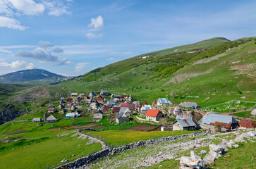 Fototapeta na wymiar Mountain village Lukomir in Bosnia and Herzegovina. Unique and traditional village. Unique village in Europe. Medieval traditional way of living. Rural tourism and holidays.
