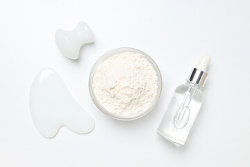 Collagen powder in a bowl on a light background