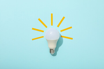 A light bulb on a blue background