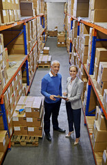 Logistics, clipboard and business people at a warehouse with top view planning, teamwork or delivery checklist. Retail, online shopping and factory team with compliance documents for cargo storage