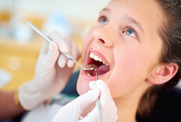 Girl, child and mouth inspection at dentist with healthcare tool, consultation or dental mirror for...
