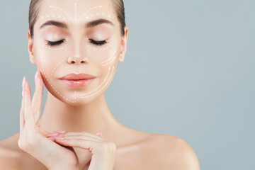 Cute fashion model face close up. Medicine, facial treatment, massage and plastic surgery concept - 769476067