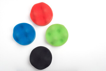 Set of buffing sponges on a white background