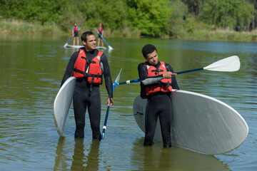 standup paddler in the lake