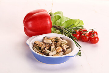 Marinated mussels in the bowl