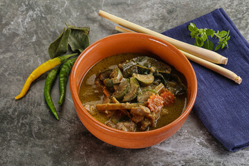 Thai green curry soup with basil