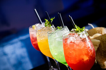 many colourful frozen cocktails smoothies