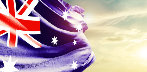 Australia national flag waving in the sky. - obrazy, fototapety, plakaty