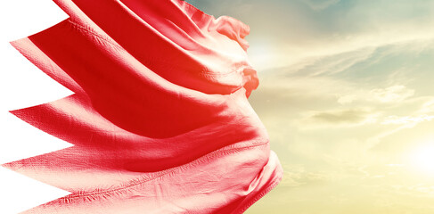 Bahrain national flag waving in the sky. - obrazy, fototapety, plakaty