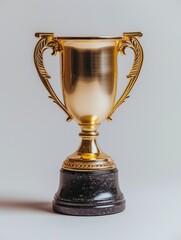 Fototapeta na wymiar Golden trophy winner cup on a light background