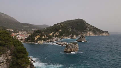 aerial view wild sea waves crushing on rocks in parga town epirus greece