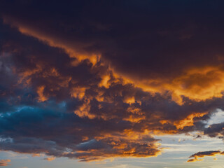 Naklejka na ściany i meble colorful and dramatic sunset clouds