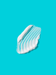 Face or body white cream, smear on colorful background