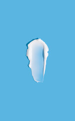 Face or body white cream, smear on colorful background