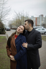 Romantic date.
Man and woman.Love of two people.Family in nature.
Real relationship.Happy family.Real couple of lovers.The couple hugs in nature.Photo for valentine's day.Valentine's day.Romance.love.