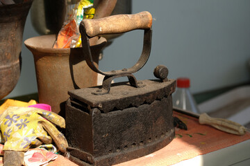 Vintage dusty iron. Corner with unnecessary things
