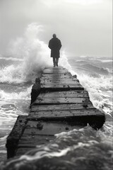 Man walking down a broken pier with rough waves around