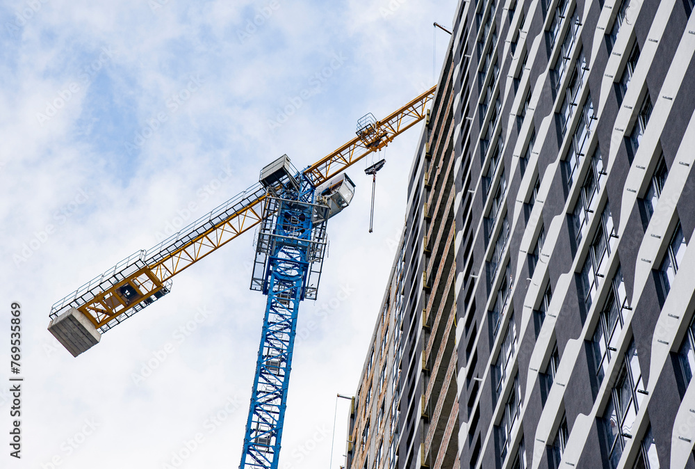 Wall mural construction site with crane