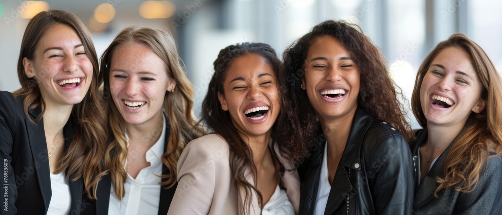 Aufkleber a multi-ethnic and age-diverse group of female businesspeople discussing and laughing in a modern of