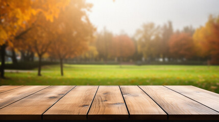 Empty blank wooden table fall background with autumn trees orange yellow color leaves backdrop forest or park nature scene abstract blurred bokeh tabletop for product display desk mockup. Copy space . - obrazy, fototapety, plakaty