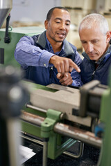 Factory, machine and men in work discussion, maintenance for industrial safety and diversity...