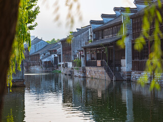 Sunset view of Nanxun, an ancient water town in Zhejiang Province, China. © Zimu