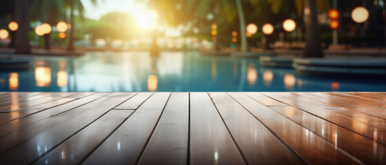 Wooden table pool bokeh background, empty wood desk product display mockup with blurry tropical hotel resort abstract poolside summer travel backdrop advertising presentation. Mock up, copy space .