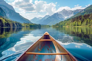 Foto op Canvas Canoeing Experience on a Tranquil Lake: Reflections of Mountains on the Water Surface © cwa