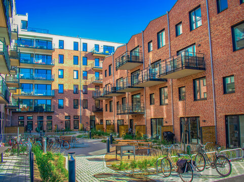 Residential area in Malm&ouml;, Sweden. Swedish neighborhood, Swedish modern architecture. Exterior. Swedish commune house. Swedish lifestyle.
