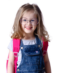 Girl child with backpack and glasses smiling on white background isolation. Childhood, education, products children