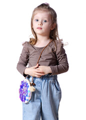 Little girl child in jeans and shirt looking smiling on white background isolation