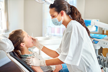 Tools, dentist and woman with child for exam, healthcare or orthodontics for teeth in clinic....