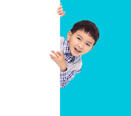 Happy Asian boy  holding with white  empty banner