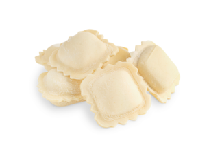Heap of frozen raw homemade italian ravioli type of pasta made with wheat dough stuffed with cheese of square shape isolated on white background used as ingredient for traditional mediterranean dinner