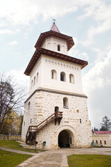 Fototapeta na wymiar Belfry of Orthodox Monastery of St. John the New in Suceava, Romania 