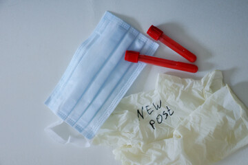 medical glove with the text new post, mask and test tube with blood for analysis - obrazy, fototapety, plakaty