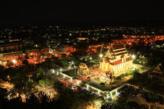 Candlelight procession in Magha Puja Day at Wat Thammikaram Worawihan (The Monkey Temple) in Prachuap Khiri Khan Province, View from Khao Chong Krachok Mountain, Thailand 