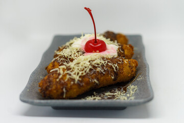 fried bananas with cherry