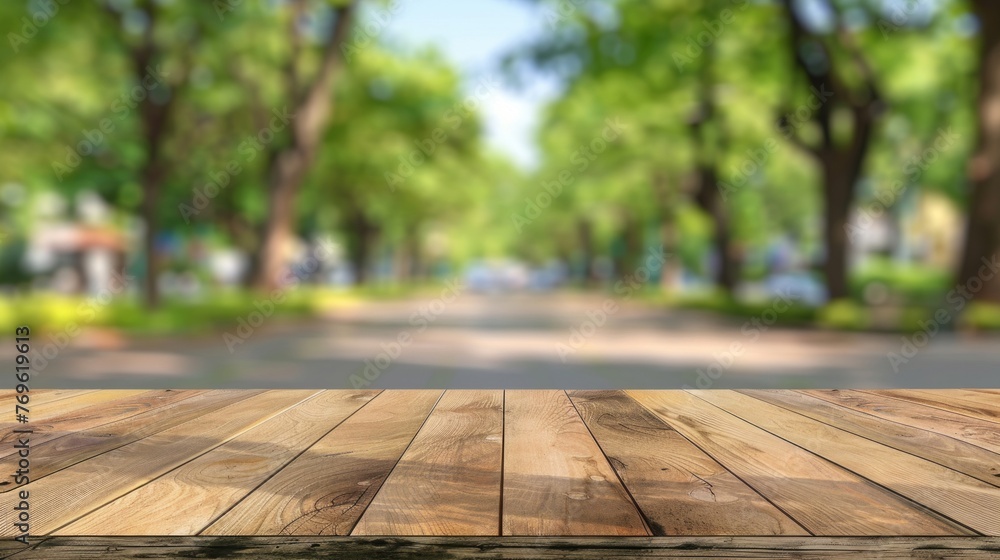 Poster close-up of an empty wooden table top with a blurred background