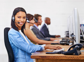 Happy woman, portrait and consultant with headphones at call center for customer service or support...