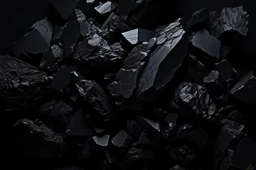 Foto op Plexiglas a pile of black rocks © Zacon